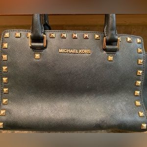 Michael Kors medium black pocket book with gold stud trim